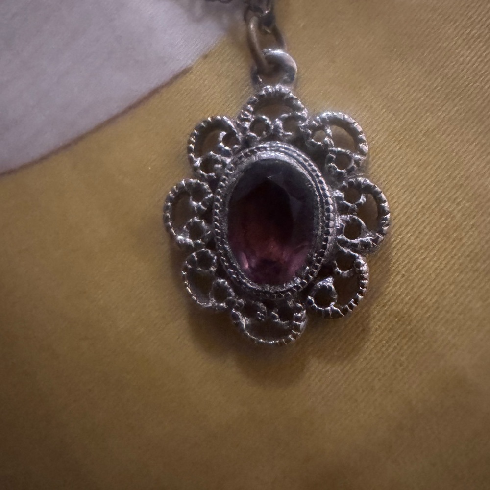 Silver-tone Filigree Pendant Necklace with Purple Cut-Glass Center